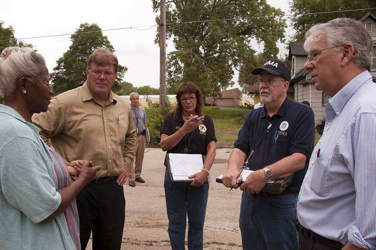 A water damage assessment being documented after a flood