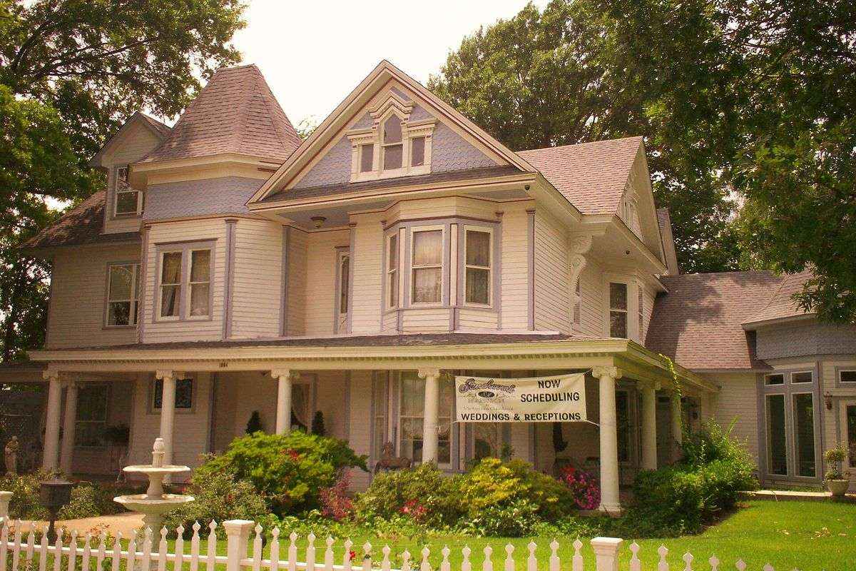 Historic home with a wraparound porch in an established Broken Arrow neighborhood