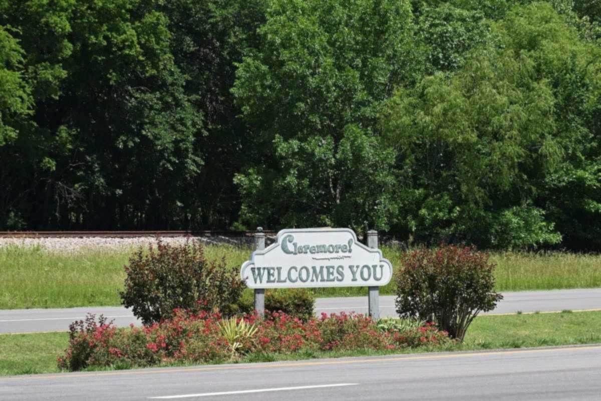 Claremore welcomes you sign with flowers at the edge of Claremore, Oklahoma