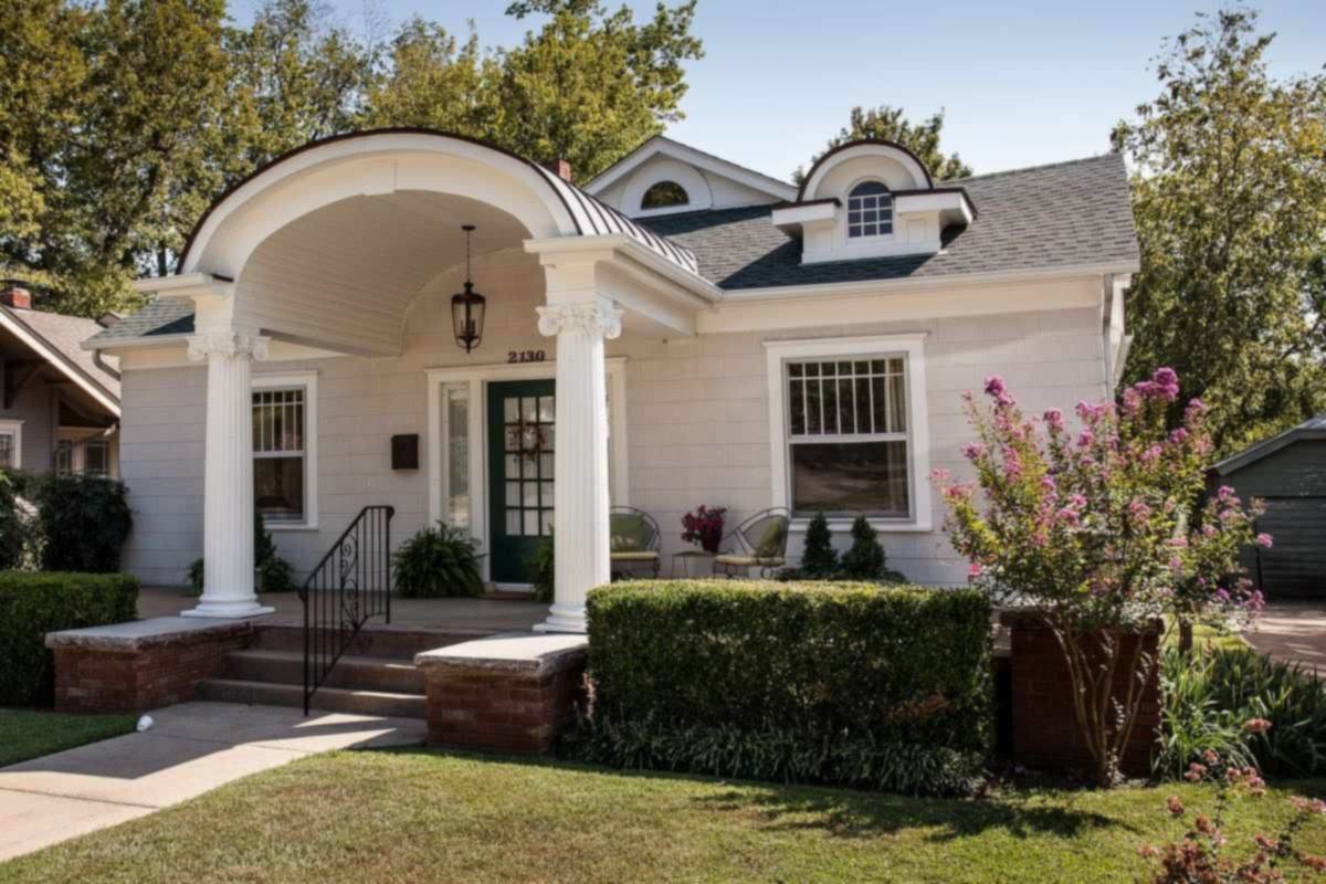 Craftsman style home with a columned porch in a Tulsa area historic district, representative of Collinsville established homes