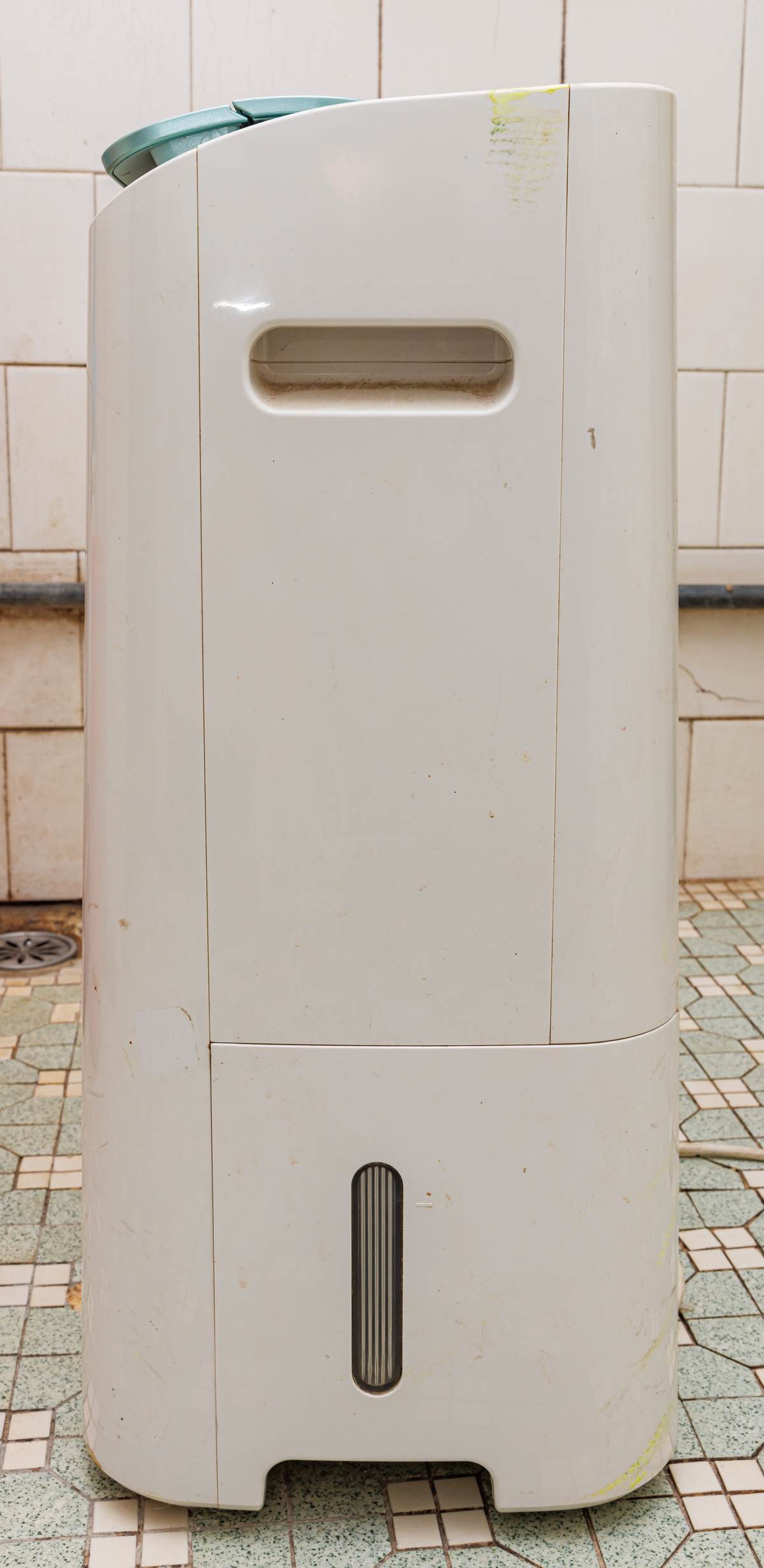 A residential dehumidifier unit of the kind used to dry damp rooms