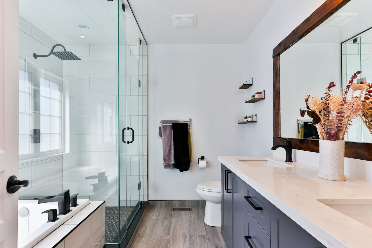 Bright bathroom interior in a Tulsa OK home, where leaks and overflows often start water damage emergencies