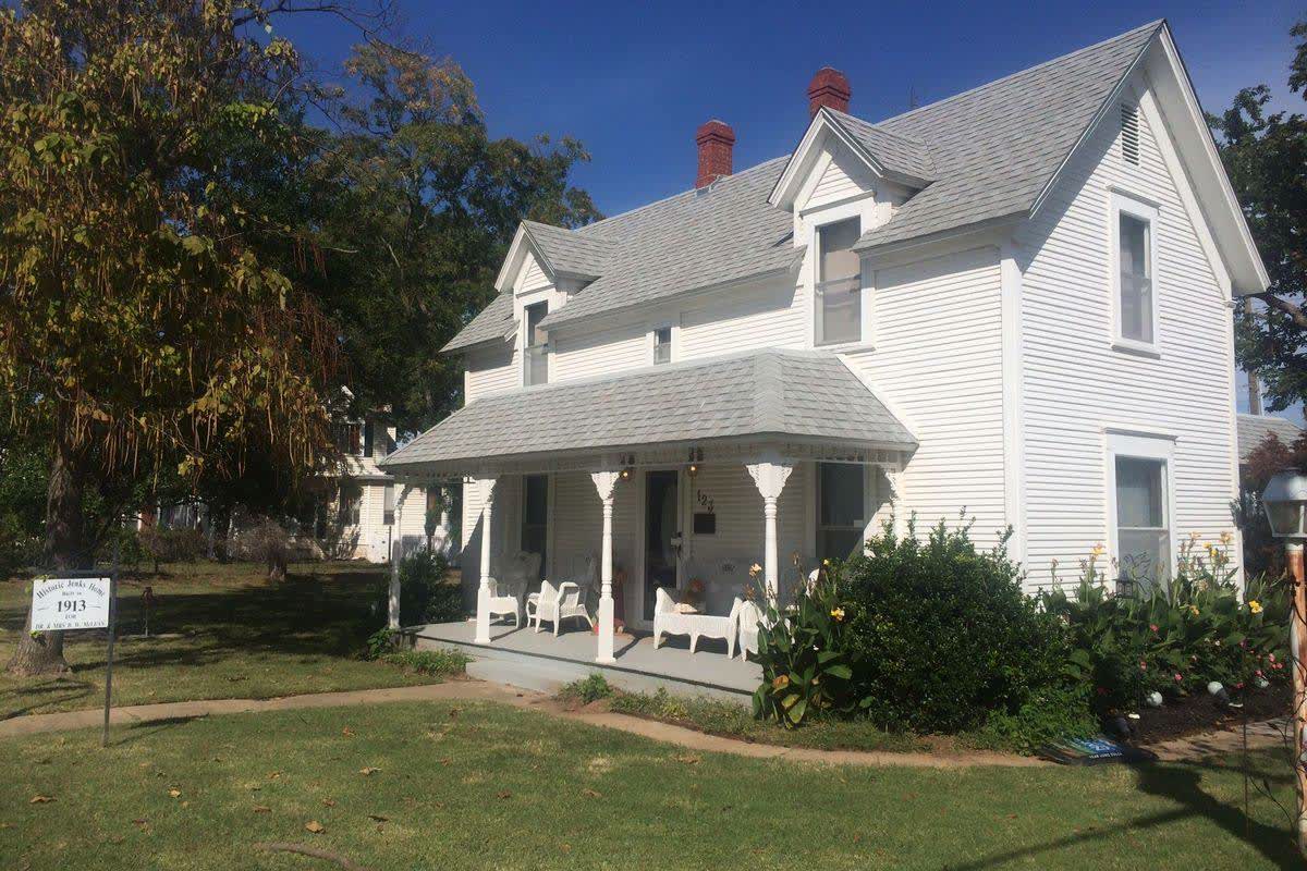 The McLean House, a historic white home in Jenks, Oklahoma