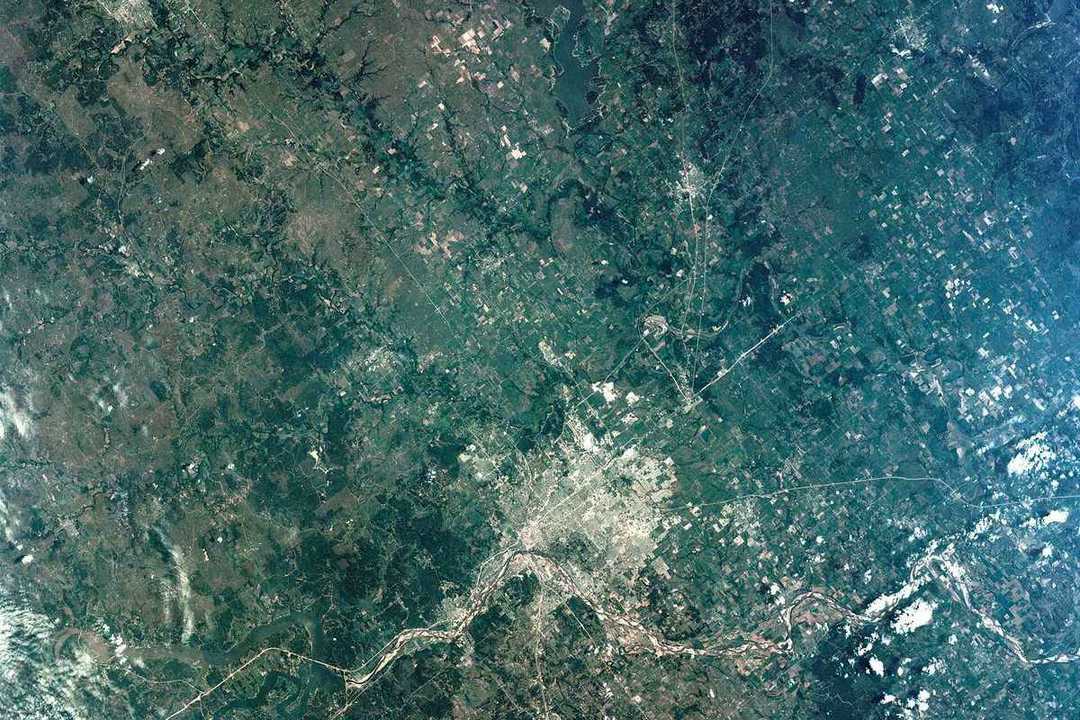 Satellite view of the Tulsa metropolitan area, with Owasso at the northern edge of Tulsa County
