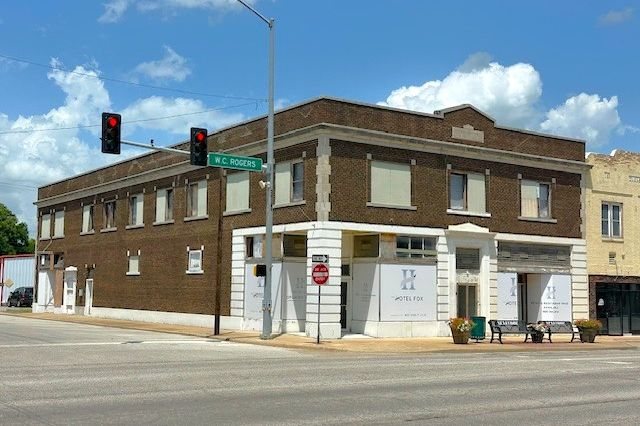 Historic brick Fox Hotel building on a downtown corner in Skiatook, Oklahoma