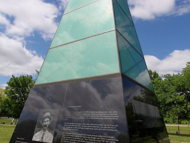 Glass monument at Black Gold Park in Glenpool, Oklahoma, honoring the Glenn Pool oil discovery