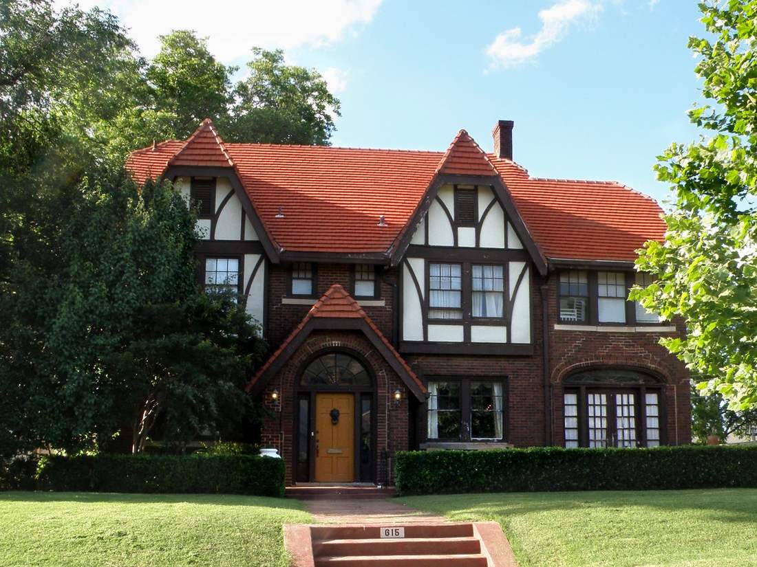 A brick Tudor revival home in Oklahoma, representative of the older housing stock in Turley