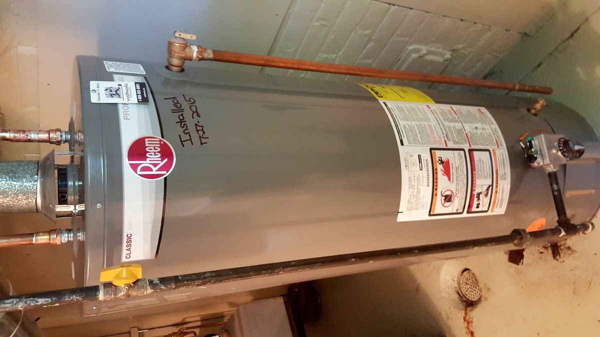 A newly installed tank water heater in a home