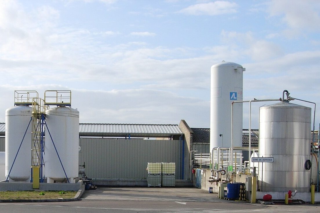 Industrial storage tanks of the kind that line the refinery corridor in West Tulsa
